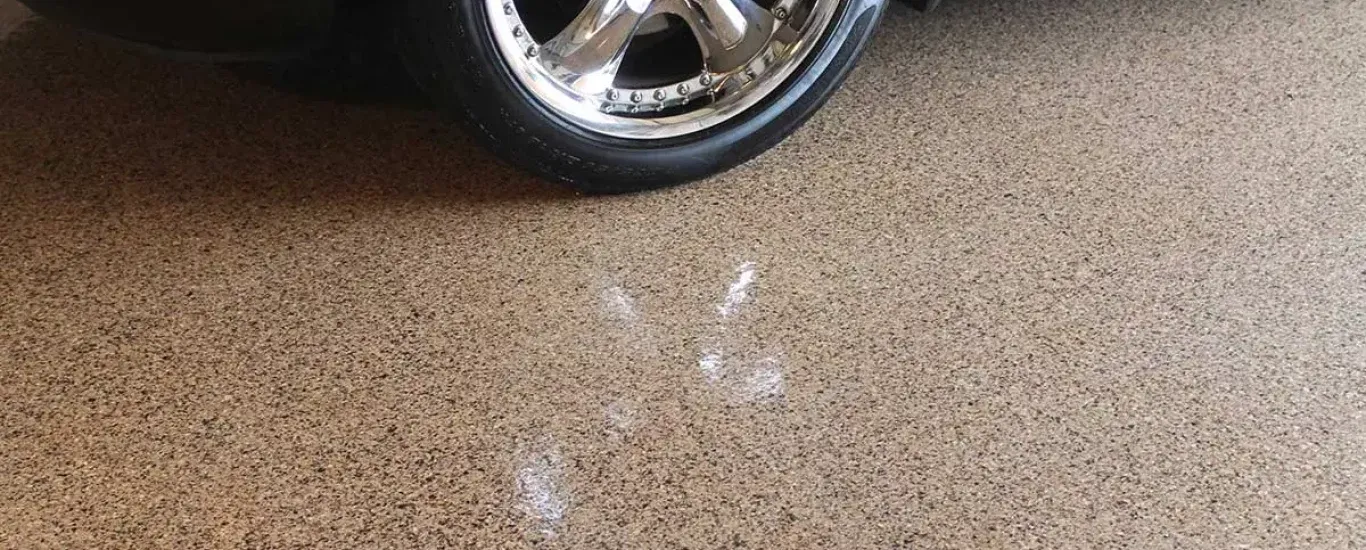 black-car-tan-garage-1200-optimized-r7j6q0kc692f3vrtk8zql2rormbjr0eb0xegz65gxo.webp